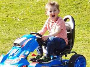 Supporting image for story: Car-mad Ben, four, pedalling around Donnington for the NHS