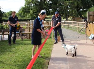 The High Sheriff of Herefordshire Helen Bowden opened the red squirrel enclosure at the Small Breeds Farm Park in Kington avidly watched by a goat