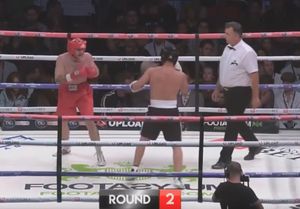 Jay, in red, taking on AnEson Gib