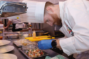 Dion-Wyn Jones putting the final touches to one of his dishes