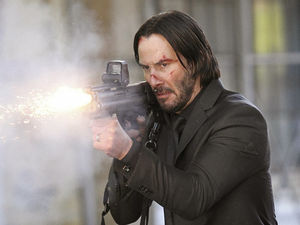 Supporting image for story: Action! It's all guns blazing on movie set with Keanu