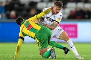 Joe Rodon of Swansea City pushes Hal Robson-Kanu of West Bromwich Albion to the floor. (AMA)