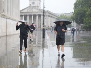 People walking in the rain.