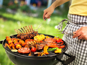 Supporting image for story: Licence to grill: Meat the men who love cooking over hot coals. . .
