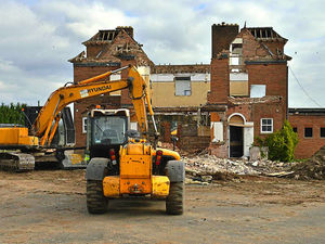 Supporting image for story: Bulldozers flatten Shropshire pub once made popular by groups of bikers