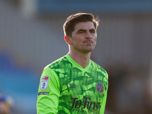 Supporting image for story: Shrewsbury Town keeper Marko Marosi hails Harry Burgoyne 