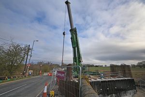  The giant crane being set up to move the beams.