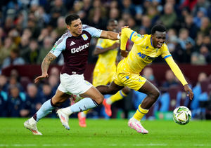 Aston Villa's Diego Carlos battles for the ball with Crystal Palace's Eddie Nketiah