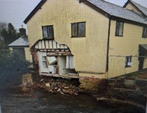A photograph of the Old Laundry taken from Lugg Bridge