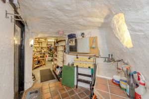 A stunning 16th-century West Midlands cottage built into a carved-out cave has gone on sale 