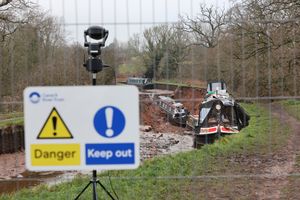 Three boats became caught up by the 50-square-metre sinkhole which developed at 4.22am today. Photo: Anita Maric/SWNS