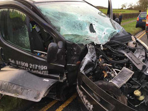 Supporting image for story: PICTURED: Driver injured and road closed as van smashes into tree