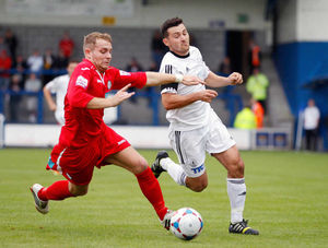 John Disney of Hednesford Town and Matty McGinn of AFC Telford United