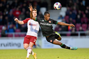 Walsall's Liam Gordon and Northampton's Sam Hoskins