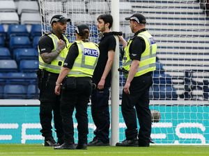 Supporting image for story: Protester ties themselves to Hampden goalpost to delay Scotland-Israel qualifier