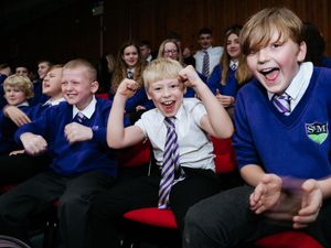 Supporting image for story: Young England supporters lift the roof off school hall with lessons put on hold for World Cup match
