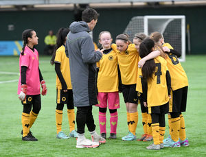 The Wolves team get a team talk before one of their games