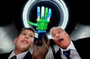 A Telford Education Showcase event at Enginuity. Pictured is Bridgnorth Endowed Pupil Charlie Foy and Keynote event speaker Ian Jukes, an educational author, who had flown over from New Zealand for the event. They are pictured with an artificial limb that has been made by company Insight.