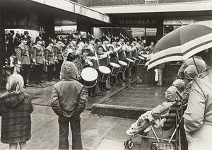 The Staffordshire Regiment Band put on a concert despite the rai, in Levetts Square, Lichfield, as part of a jubilee appeal by the men at Whittington Barracks, August 1977.