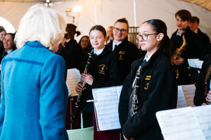 Camilla, Queen Consort, meeting the Abraham Darby Showband.