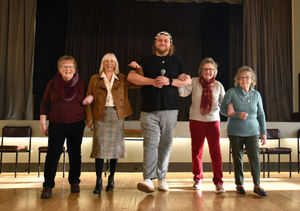 Telford singing builder Callum Doignie with Ironbridge and Coalbrookdale Civic Society members at Madeley Anstice hall. LtoR Gill Beach, Viv Moore, Margaret Roberts and Vicky Jones. Picture by DAVID BAGNALL