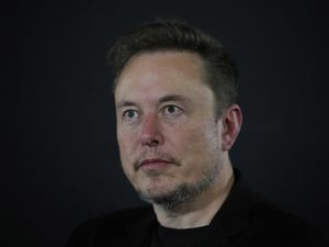 Elon Musk said there was a cyberattack on X (Kirsty Wigglesworth/PA)