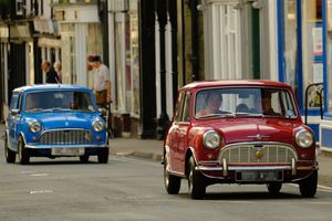Mini marvels parading up Kington High Street on their way to the Vintage Show. Image by Andy Compton