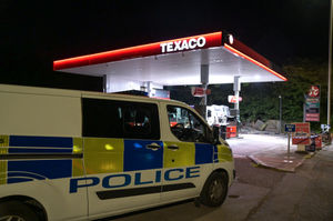 A police presence was seen at the petrol station and remained a day later. Photo: SnapperSK