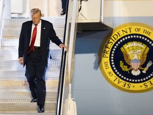 President Donald Trump arrives on Air Force One at Palm Beach, Florida