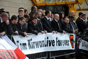 Mourners gather to pay their respects at Molineux on the day of the funeral