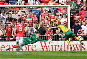 Jack Payne fires in the penalty to put Swindon 3-0 up