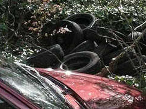 Supporting image for story: Tyres dumped near church