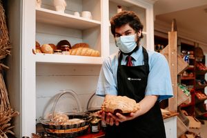 David Newtown, 20, with some of the bread baked at the college 