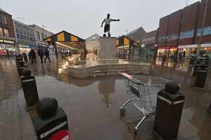 The lone statue of one of Dudley's favourite sons - Duncan Edwards - stands as a lone beacon of a landmark in a wet and seemingly deserted town centre