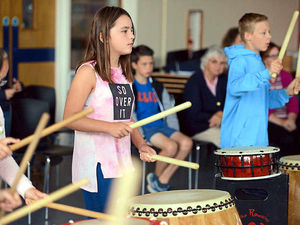 Supporting image for story: Video and pictures: Big bash as children return to school for drumming sessions