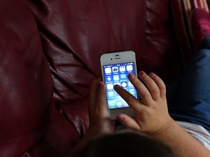 A child using a smartphone