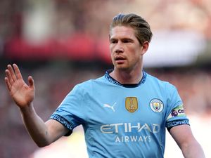 Kevin De Bruyne gestures during a game for Manchester City