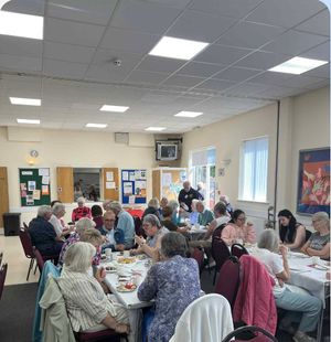 Guests enjoying tea and talk