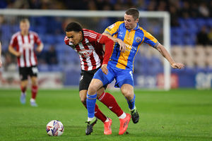 Jordan Rossiter of Shrewsbury Town and Kamari Doyle of Exeter City (AMA)