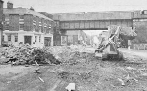 August 25, 1970, the caption reads: 'A new view of Shifnal has opened with the demolition of old shops in the town centre to make way for redevelopment.' 