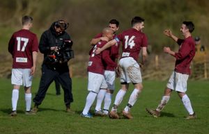 Celebrations as Carlos scores a penalty 