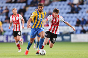 Rekeil Pyke of Shrewsbury Town and Conor McGrandles of Lincoln City. (AMA)
