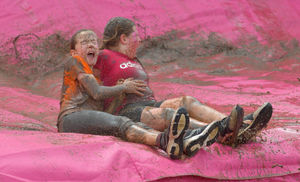 Braving the slide at the end of the course
