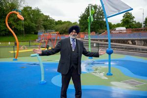 Councillor Bhupinder Gakhal, cabinet member for resident services, with some of the attractions at East Park splash pad