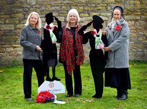 A remembrance service at the churchyard of All Saints Church, Sedgley, to remember the women who died in war. Pictured with the new statues are Kay Stokes, Karen Moore and Nicky Hawkins-Pinchers from Sedgley Townswomen Guild.