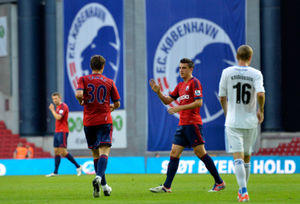 Gabriel Tamas of West Bromwich Albion celebrates after he scores a shot that took a defelection he is congratulated by George Thorne of West Bromwich Albion