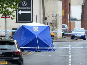 Supporting image for story: Police search for white BMW after teenager shot in Wolverhampton