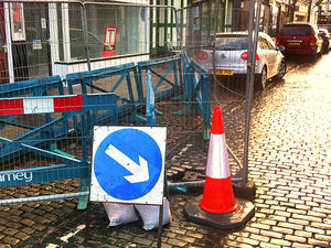 Supporting image for story: Hole opens up in Newport street