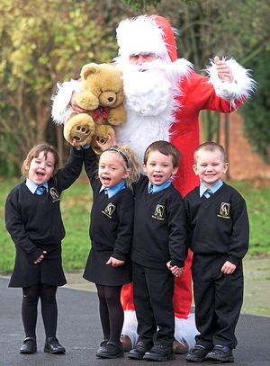 Tyne-Lexy, from Cannock, is the latest star on hit show Love Island.

Amanda Da Costa Maia (cor) aged four, Tyne-Lexy Clarson (cor) aged three, Curtis Marshall aged three and Jamie Whelan aged three from Cannock at the Chase Academy with Santa for their Christmas fair with name the teddy competition.