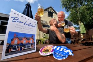 The Rising Sun Pub is hosting its annual beer festival. Pictured is landlord Malcolm Roberts, and regular at the pub who travels all the way from Preston, Mark Bearton. 